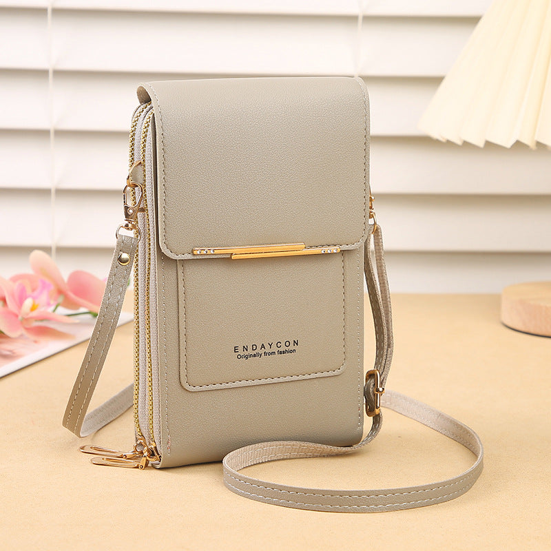 👜📱 Simple and elegant touchscreen phone bag for women, designed to be worn over the shoulder.